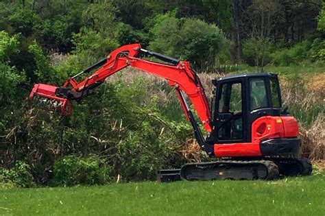 mini excavator brush hog attachment|excavator with bush hog attachment.